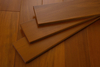 China Hardwood Flooring Factory Directly Sells Indoor Teak Color Solid Wood Flooring 610mm Length